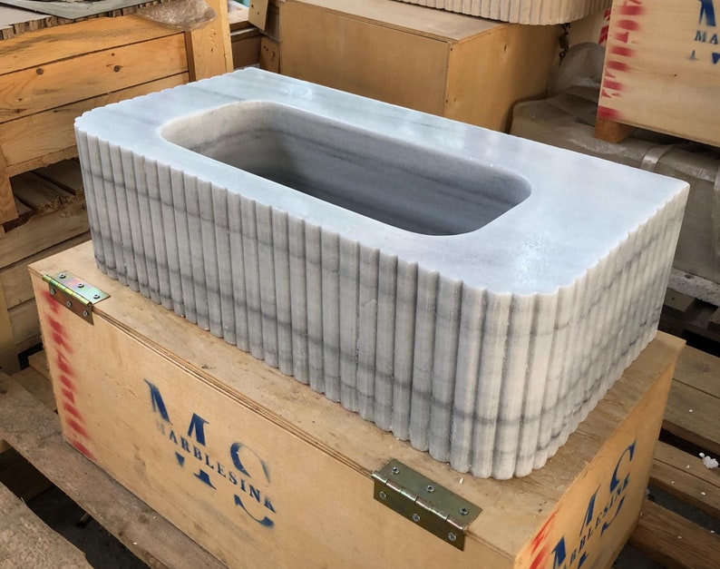fluted-carrara-marble-wall-mounted-sink.jpg