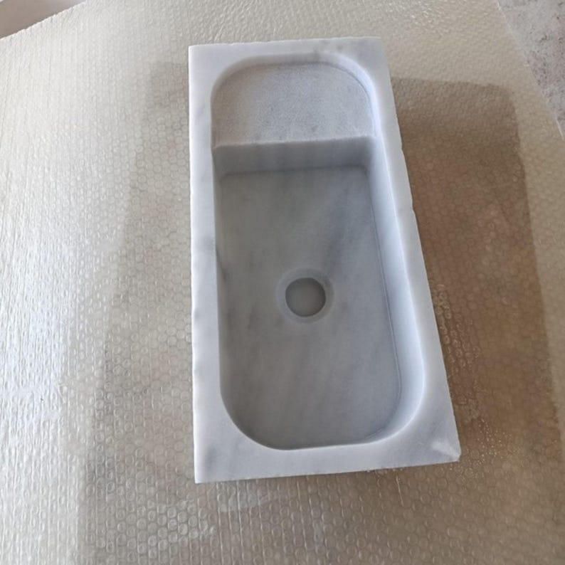 handmade-stone-sink-with-soap-dish.jpg