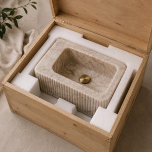 secure-packaging-marble-wall-sink.jpg
