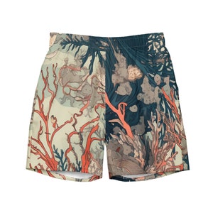 Puede incluir: Pantalones cortos de baño con un estampado integral que representa una escena submarina. El diseño incluye corales en tonos rojos y naranjas, sobre un fondo de color turquesa y gris. Los pantalones cortos tienen cintura elástica y corte holgado.