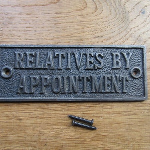 Rustic iron Plaque Housewarming gift Cast iron vintage finish RELATIVES BY APPOINTMENT Sign Wall door Decor Plaque