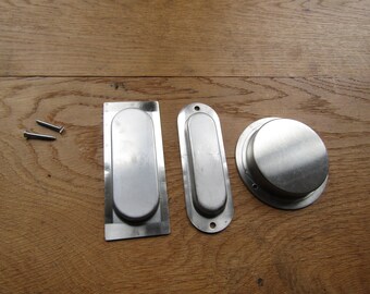 thumbnail interactive-video image 1 of Stainless Steel Oval Recessed Flush Pull Handle For Sliding Doors/Cabinets – 2 Screws 1 of 5