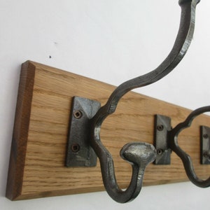 thumbnail image 2 of Vintage Cast Iron 5-Hook Coat Rack – Rustic Wall Mount, Old English Style 2 of 5