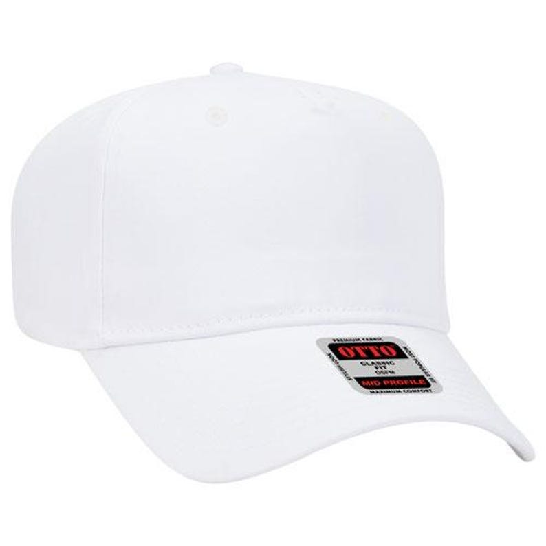 May include: A white baseball cap with a curved brim. The cap has a classic fit and a mid-profile design. The tag on the brim reads "OTTO" and "Premium Fabric".