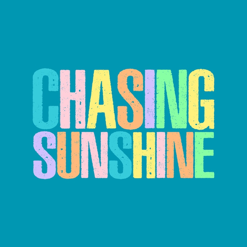 May include: Text graphic on a teal background. The words "CHASING SUNSHINE" are displayed in large, distressed, multi-colored letters. The letters are in pastel shades of pink, orange, yellow, green, and blue.
