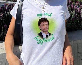 May include: White t-shirt with a green heart graphic and the text "my irish boyfriend".