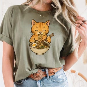 Orange Cat Eating Ramen Noodles Unisex Tee, Cat Lovers Aesthetic Shirt, Hilarious Cat Graphic Tshirt, Cartoon Kitty Top, Cool Animal Funny