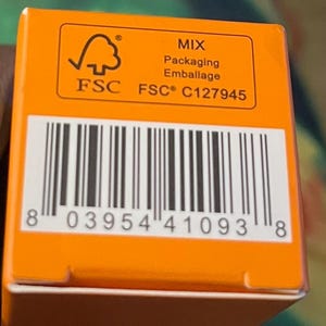 May include: A bright orange rectangular product box featuring a black barcode with the number 8 03954 41093 8 printed below. Above the barcode is an FSC logo with the text MIX, Packaging, Emballage, and the code FSC C127945 in black ink.