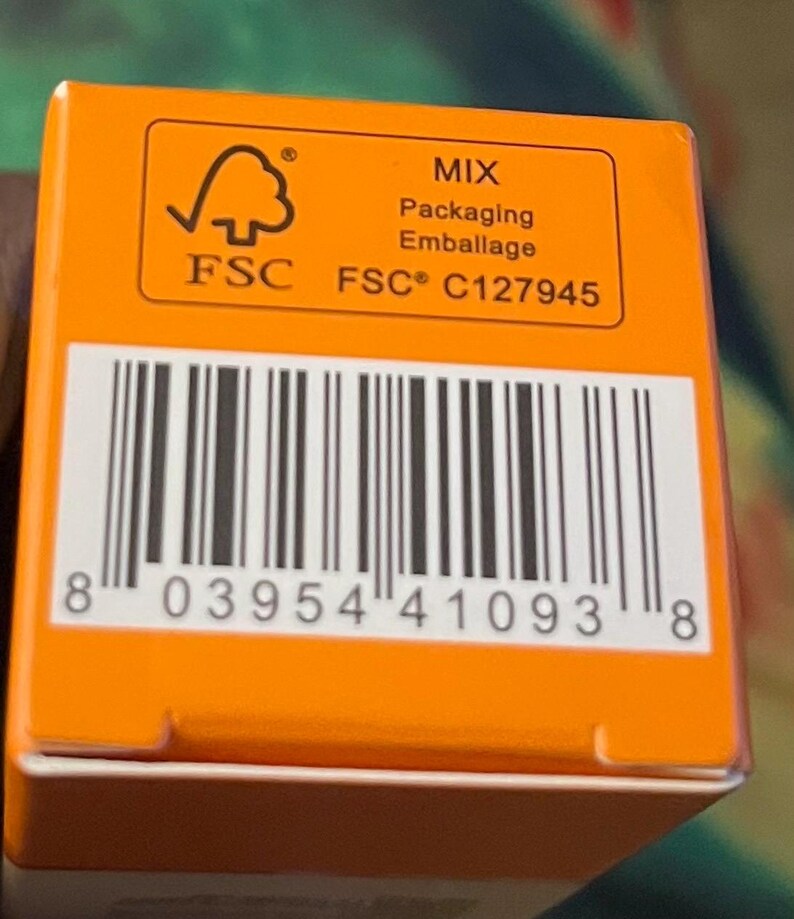 May include: A bright orange rectangular product box featuring a black barcode with the number 8 03954 41093 8 printed below. Above the barcode is an FSC logo with the text MIX, Packaging, Emballage, and the code FSC C127945 in black ink.