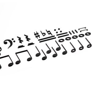 Puede incluir: Recortes negros de notas y símbolos musicales sobre un fondo blanco. Los símbolos incluyen una clave de sol, una clave de fa, un sostenido, un bemol, un natural, una negra, una corchea, una semicorchea, una redonda, una blanca y una blanca con puntillo.