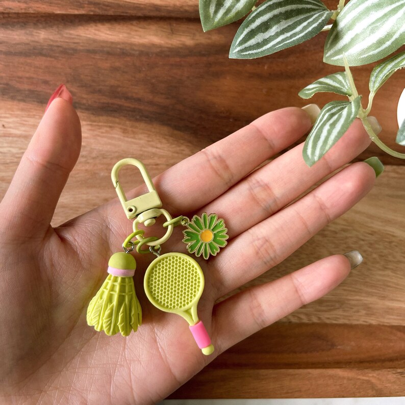 thumbnail image 2 of Cute Bag Charm Plush Tennis Keychain With Smiling Face - Cute Kawaii Tennis Ball Bag Charm For Sports Fans Tennis Ball Smiling Keychain 2 of 10