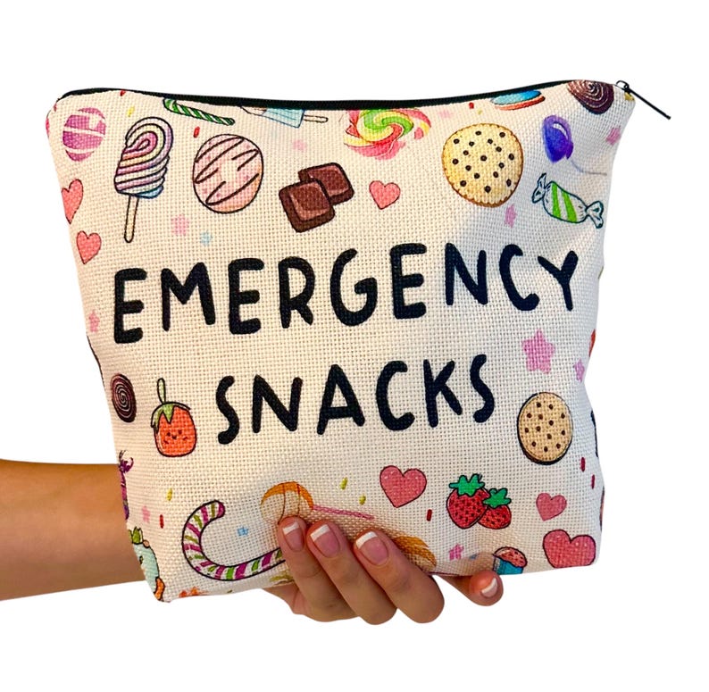 a zip up pouch that says 'Emergency snacks'