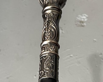elegant walking stick, metal cane,black Cain with silver handle.