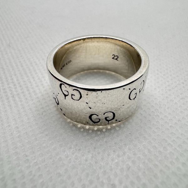 silver ring by Gucci