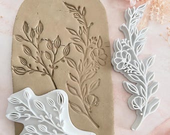 Kleistempelset met zaaddozen en wilde bloemen