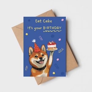 Tarjeta "Come Pastel" de Shiba Inu tamaño A6 (11,4 x 15,8 cm) con sobre. Interior en blanco para tu mensaje. Perfecta para cualquier amante de los perros.