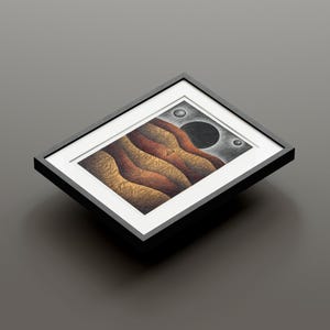May include: A framed abstract art print with a black background and a gold, red, and brown landscape with three white circles.