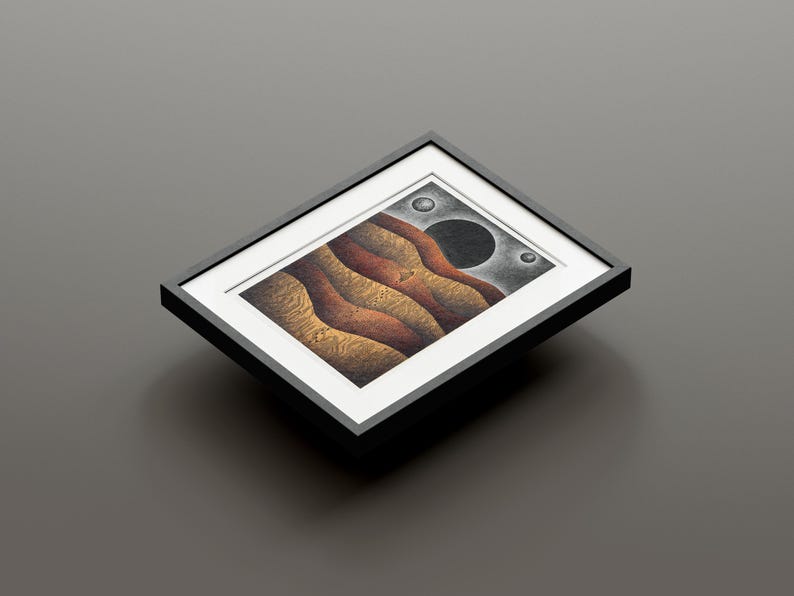 May include: A framed abstract art print with a black background and a gold, red, and brown landscape with three white circles.