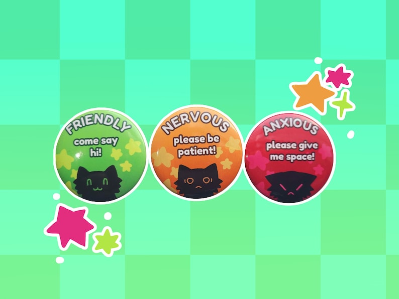 May include: Three round buttons with black cat illustrations and text. The green button says "FRIENDLY come say hi!" The orange button says "NERVOUS please be patient!" The red button says "ANXIOUS please give me space!"