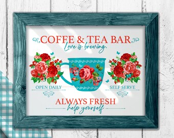 May include: A teal framed sign with the text "COFFE & TEA BAR. Love is brewing. OPEN DAILY. SELF SERVE. ALWAYS FRESH. help yourself."  The sign features a large blue and white teacup with a floral pattern and two floral bouquets on either side of the cup.
