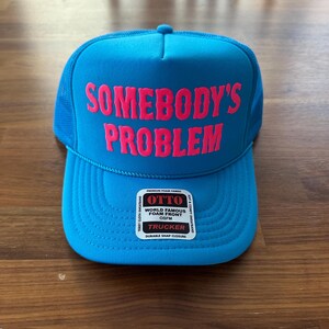 Somebody's Problem Embroidered Trucker Hat