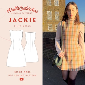 May include: A sewing pattern for a Jackie shift dress. The pattern is available in sizes XS-XXXL. The image shows a woman wearing a plaid dress, a light pink long-sleeved shirt, and black tights. The dress is a shift style with a round neckline. The pattern is available as a PDF download.