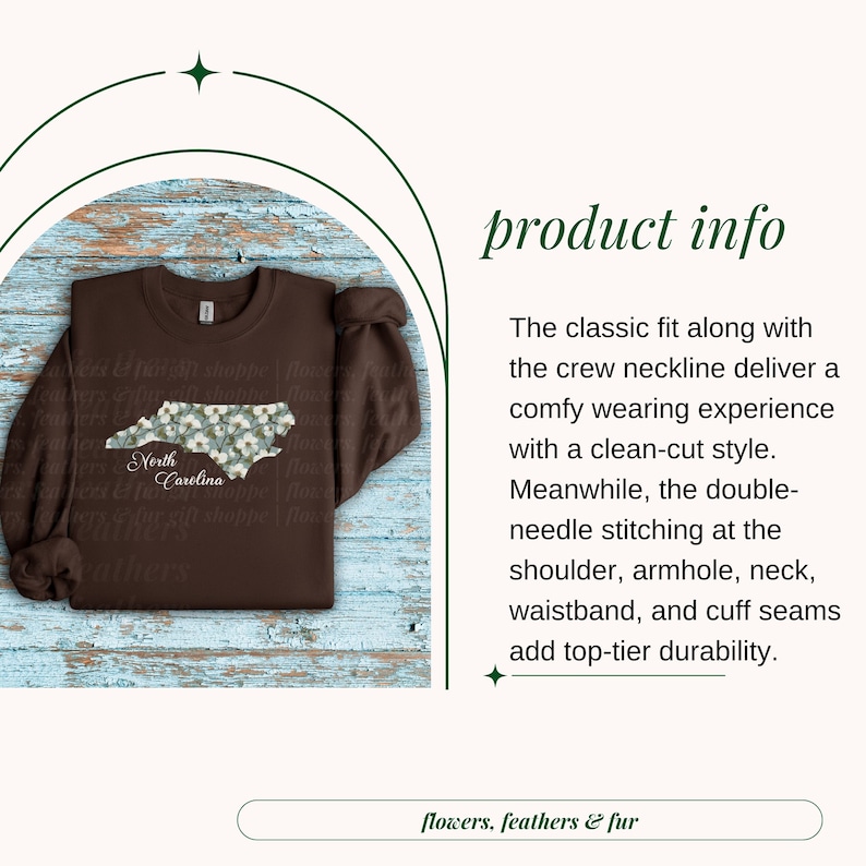 May include: A brown sweatshirt featuring a floral design in the shape of North Carolina. The text "North Carolina" is below the design. The sweatshirt has a crew neckline and long sleeves. The words "flowers, feathers & fur" are at the bottom.