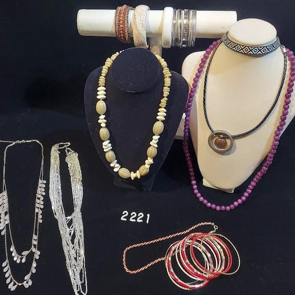 Mixed bargain bag of quality costume jewelry has 7 necklaces 35 bangles and 4 bracelets as sets or stand-alone items in good condition