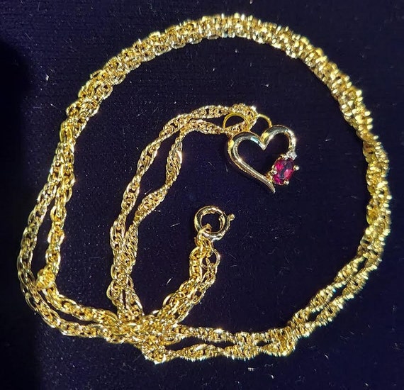 Gold tone pendant necklace has heart shaped penda… - image 2