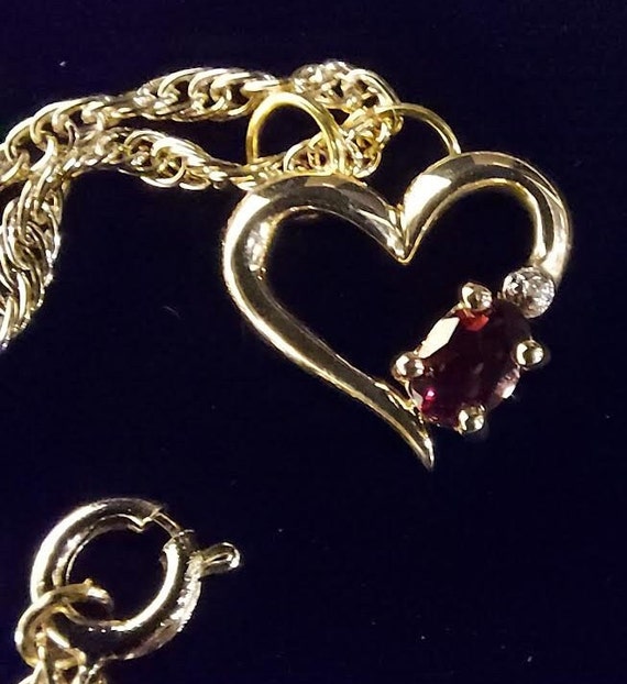 Gold tone pendant necklace has heart shaped penda… - image 6