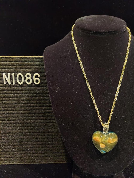 Art glass heart shaped pendant has glittery coppe… - image 1