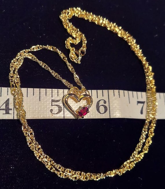 Gold tone pendant necklace has heart shaped penda… - image 3
