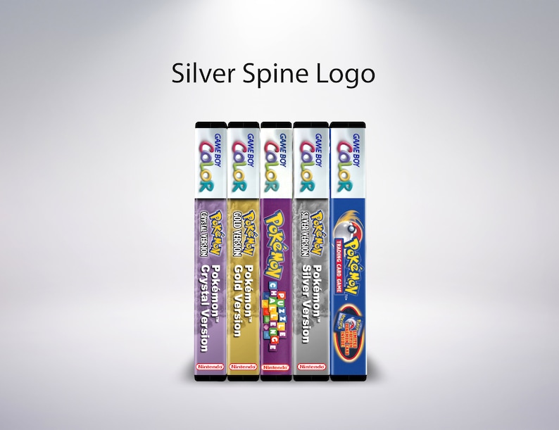 May include: A collection of Game Boy Color game boxes, including "Pok&eacute;mon Crystal Version," "Pok&eacute;mon Gold Version," "Pok&eacute;mon Puzzle Challenge," "Pok&eacute;mon Silver Version," and "Pok&eacute;mon Trading Card Game." The boxes are vertically aligned, with the "Silver Spine Logo" text at the top.