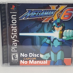 Puede incluir: Una caja de juego de PlayStation para Mega Man X6. La caja es azul y roja con una imagen de Mega Man en la parte delantera. El texto "No Disc" y "No Manual" está impreso en la parte delantera de la caja.
