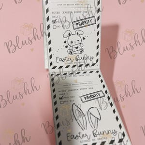 May include: Two white and black Easter Bunny themed cards. The cards have the text "Special Delivery For", "Open on Easter Morning 2016", and "Easter Bunny". One card has a bunny graphic and the other has bunny ears.