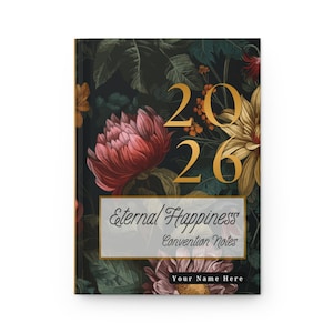 May include: A hardcover journal with a floral design and the text "2026." The cover features a dark background with pink, yellow, and red flowers. The journal has a rectangular label with the words "Eternal Happiness Convention Notes" and "Your Name Here."