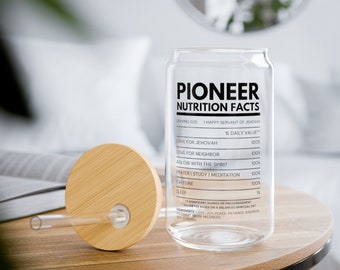 May include: A clear glass water bottle with a bamboo lid and straw. The bottle has a label that reads "Pioneer Nutrition Facts" and lists various "nutritional" values such as "Love for Jehovah", "Love for Neighbor", "Aglow with the Spirit", "Prayer | Study | Meditation", "Caffeine", and "Sleep".