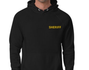 May include: Black hooded sweatshirt with a yellow embroidered "SHERIFF" on the front.