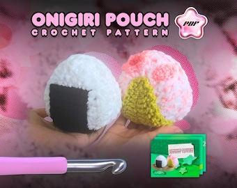 May include: Image of two crocheted onigiri pouches, one white with a black seaweed accent, the other pink and white with a yellow accent. The text "ONIGIRI POUCH CROCHET PATTERN" is displayed above the pouches. A pink crochet hook and pattern are also visible.