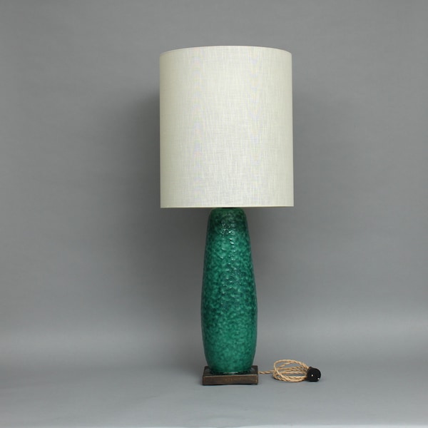 Pieter Groeneveldt (1889-1982) green glazed earthenware lamp base with white lampshade, marked with stamp