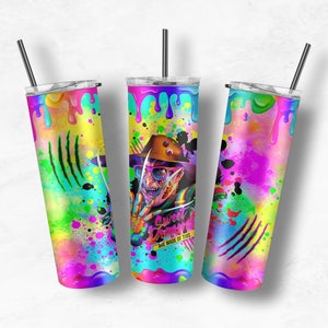 May include: Three stainless steel tumblers with colorful paint splatter designs. The center tumbler features a character with a Freddy Krueger-like appearance and the text "Sweet Dreams Are Made Of This".