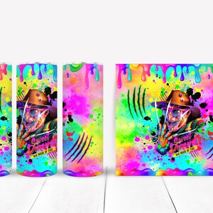 May include: A colorful sublimation design featuring a horror movie character with a knife and the text "Sweet Dreams Are Made Of This". The design is perfect for a tumbler or other sublimation projects.