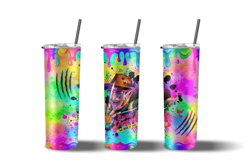 May include: Three stainless steel tumblers with colorful paint splatter designs. The center tumbler features a graphic of a character with a knife and the text "Sweet Dreams Are Made Of This".