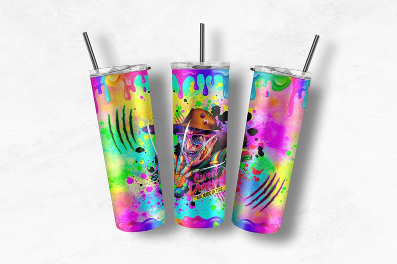 May include: Three stainless steel tumblers with colorful paint splatter designs. The center tumbler features a character with a Freddy Krueger-like appearance and the text "Sweet Dreams Are Made Of This".