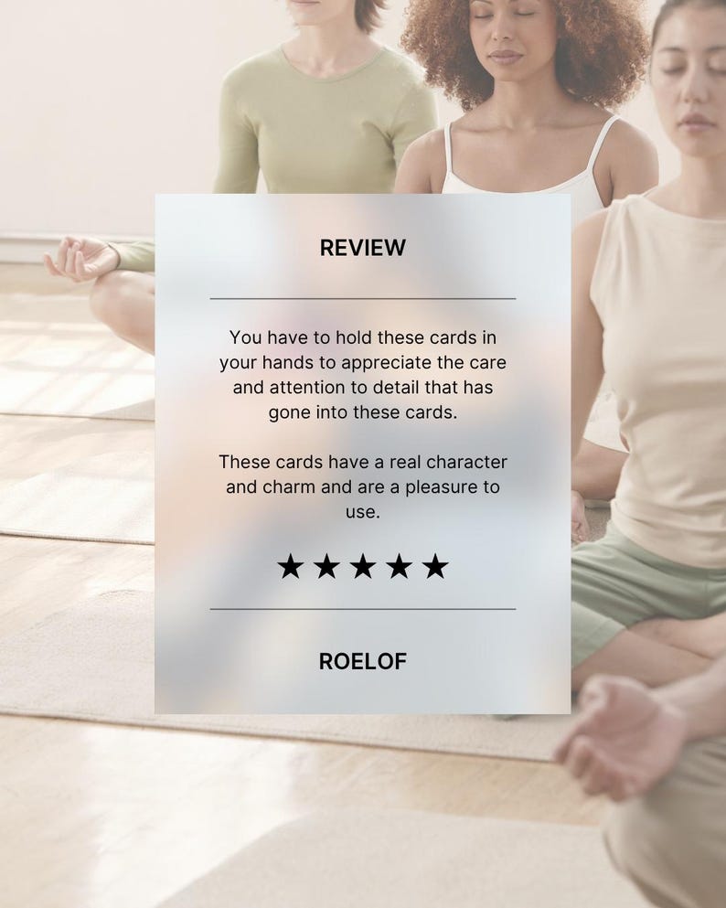 image shows a yoga studio with yogis in a seated position. text is a review which reads ' you have to hold these cards in your hands to appreciate the care and attention to detail that has gone into these cards.  these cards have real character and charm and are a pleasure to use.'