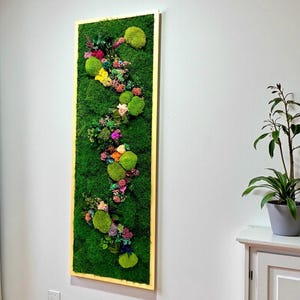 Bring everlasting greenery into your home with handcrafted moss and preserved plant art.
