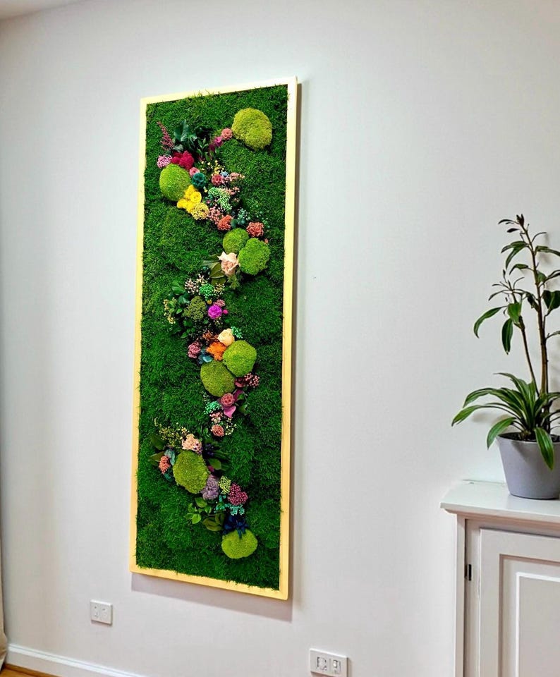 Bring everlasting greenery into your home with handcrafted moss and preserved plant art.