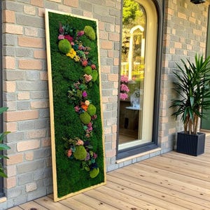 Bring everlasting greenery into your home with handcrafted moss and preserved plant art.