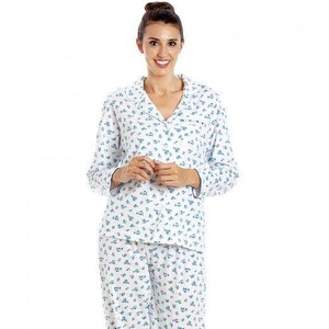 May include: White pyjamas with a blue floral print. The top has a collared neckline and long sleeves. The trousers have a straight leg.