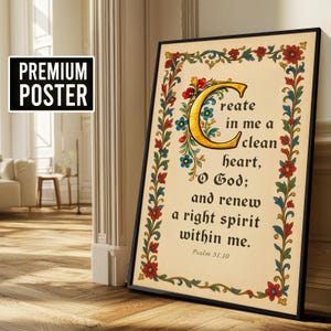 May include: A framed poster featuring the text "Create in me a clean heart, O God; and renew a right spirit within me. Psalm 51:10." The text is in a decorative font with a large, ornate initial "C". The border is adorned with floral designs.